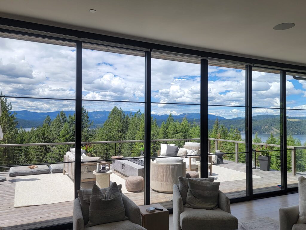 High-end residential window cleaning for a custom home in Rathdrum, ID by Bullseye Wash Systems, providing streak-free windows and spotless results.