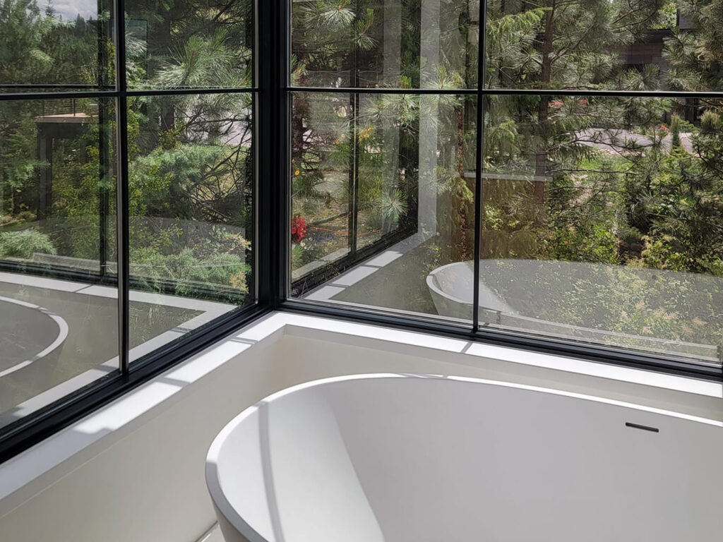 Pressure washing services for the exterior of a home in Bayview, ID by Bullseye Wash Systems.