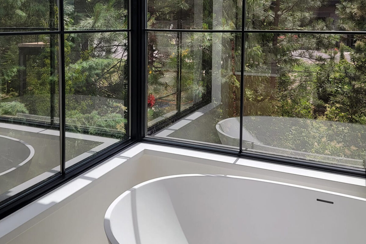 Pressure washing services for the exterior of a home in Bayview, ID by Bullseye Wash Systems.