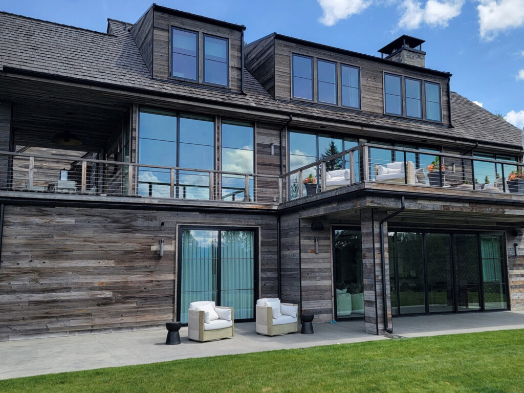 Pressure washing for a high-end custom home in Coeur d'Alene, ID by Bullseye Wash Systems, effectively removing dirt, grime, and mildew from exterior surfaces.