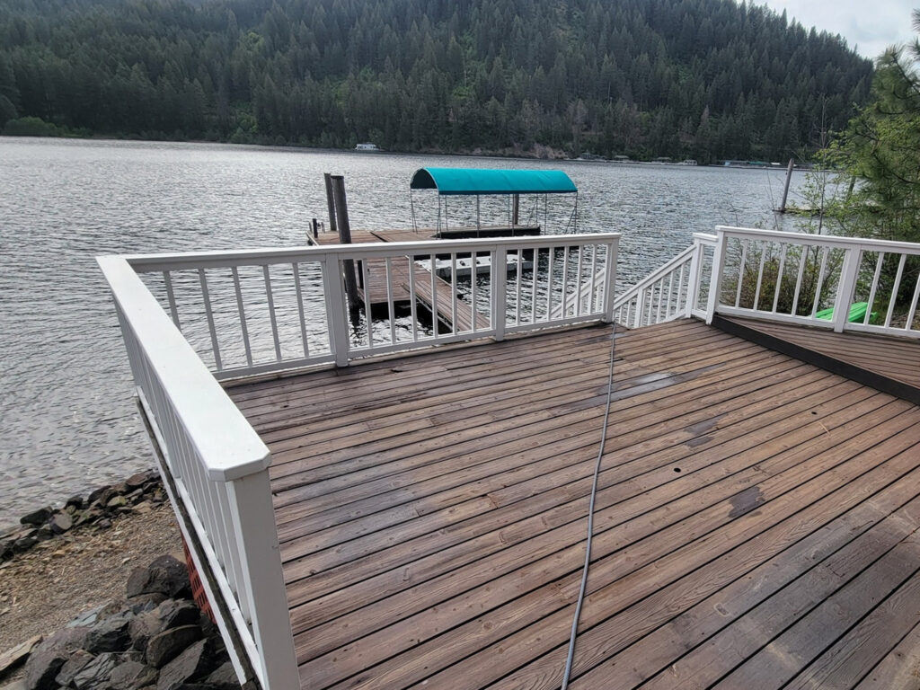 Pressure washing of residential property in Colbert, WA by Bullseye Wash Systems.