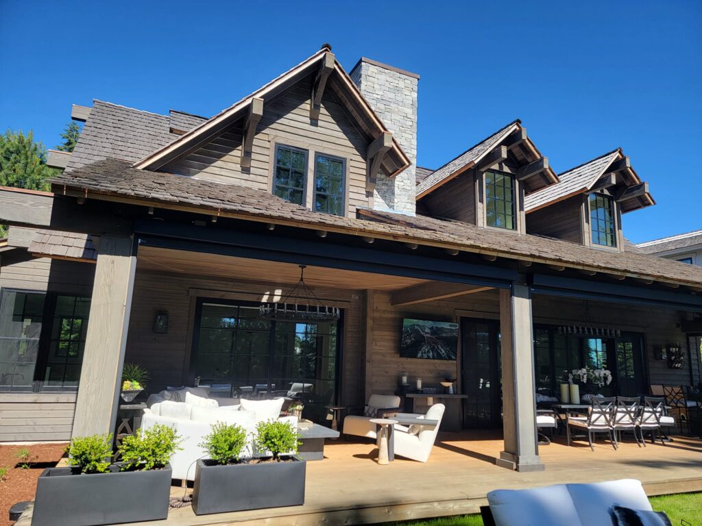 Residential pressure washing and soft washing of the siding in Post Falls, ID by Bullseye Wash Systems, removing mold, grime, and algae from home exteriors.