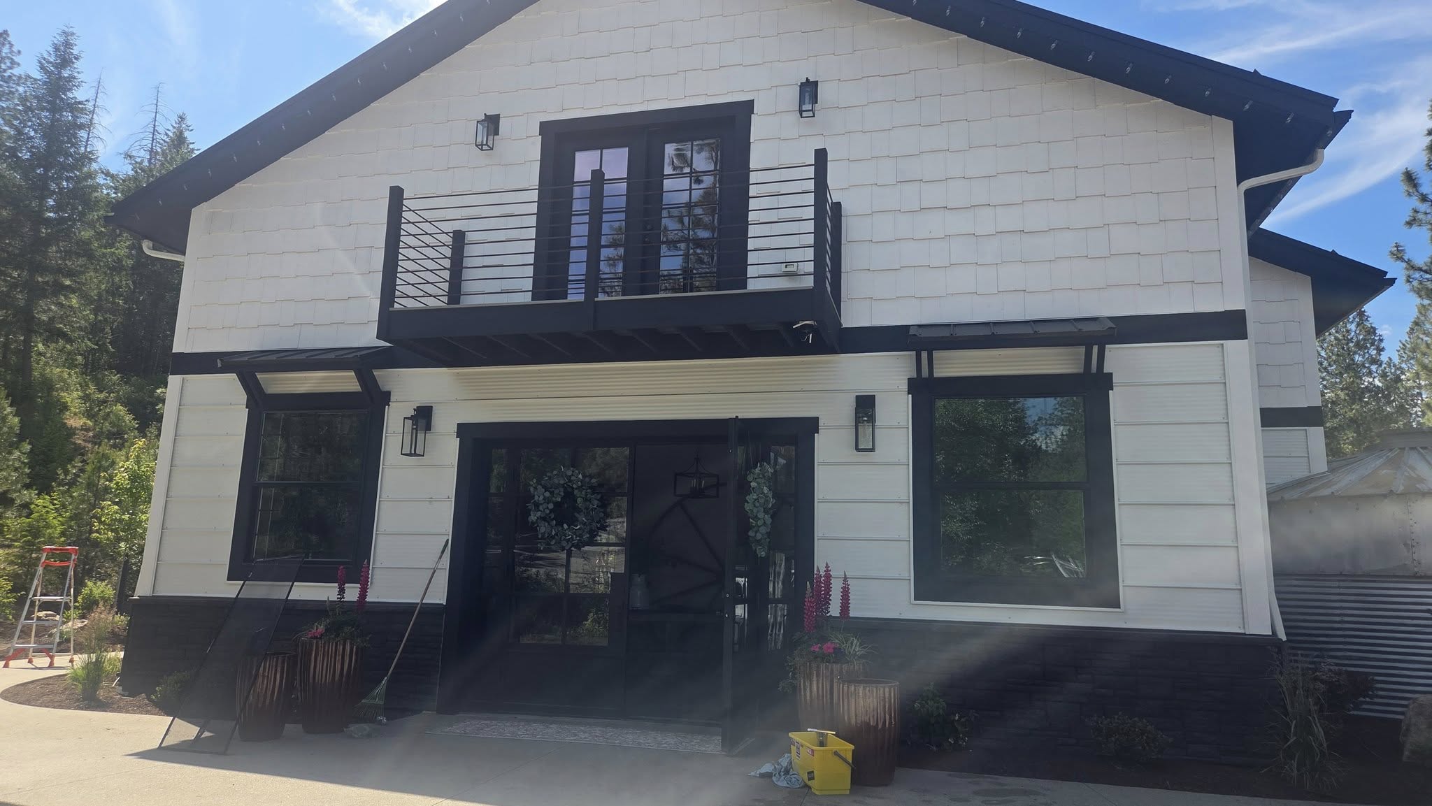 Expert roof soft washing for homes in Spirit Lake, ID. Bullseye Wash Systems cleans roofs by safely removing debris and moss, protecting your home’s roof for years to come.