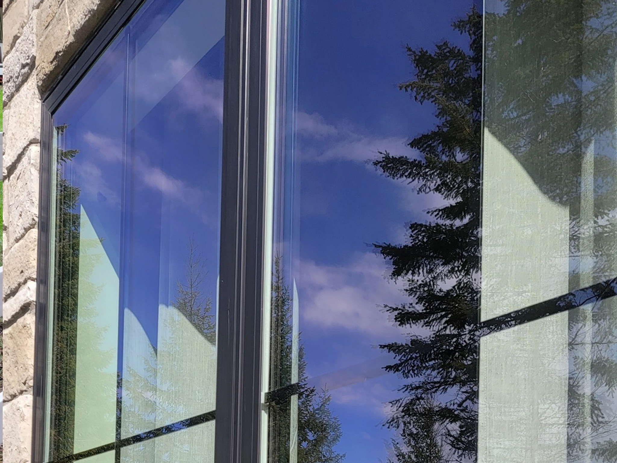 Soft washing services for a luxury home in Rathdrum, ID with views of Vanishing Prairie, provided by Bullseye Wash Systems.