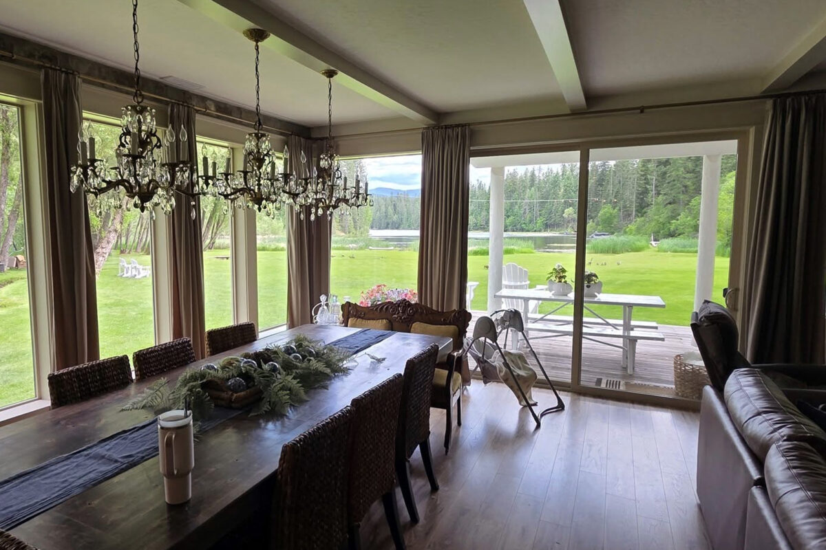 Window washing for a custom home in Mead, WA, provided by Bullseye Wash Systems, leaving the windows streak-free and sparkling.