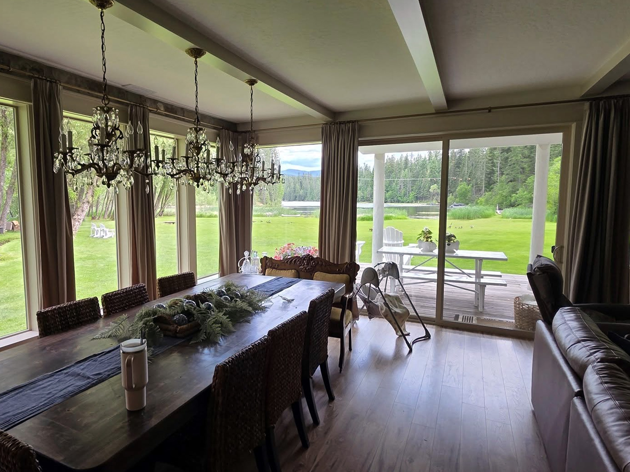 Window washing for a custom home in Mead, WA, provided by Bullseye Wash Systems, leaving the windows streak-free and sparkling.