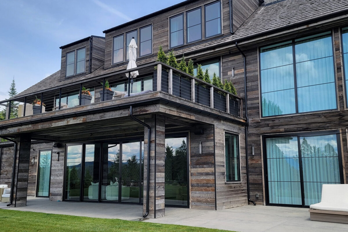 Window washing for a high-end custom home in Coeur d'Alene, ID, provided by Bullseye Wash Systems, restoring clarity and shine to your windows.
