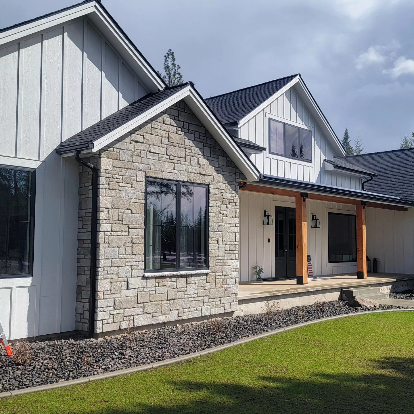 Window washing for a luxury golf course home near Hayden Lake, ID by Bullseye Wash Systems, providing spotless windows for a beautiful view.