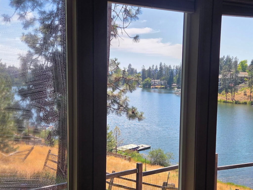 floor to ceiling residential window cleaning near Hayden Lake Idaho overlooking lakefront property