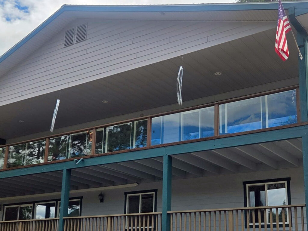 commercial window cleaning and glass balcony railing cleaning at StoneRidge Resort Blanchard Idaho