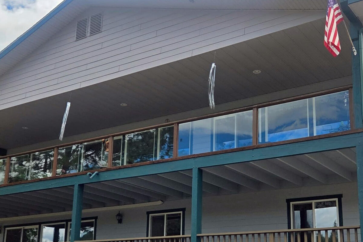 commercial window cleaning and glass balcony railing cleaning at StoneRidge Resort Blanchard Idaho