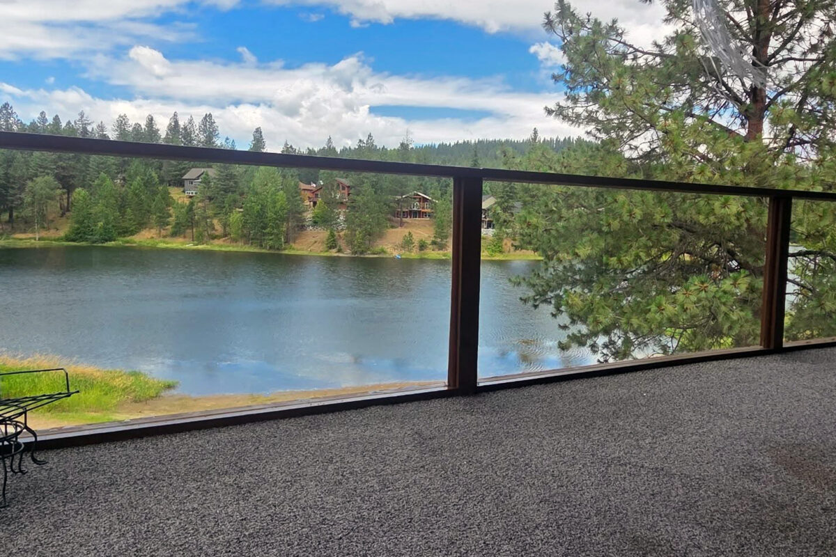 exterior window cleaning near Athol Idaho showing clear reflections in freshly cleaned glass