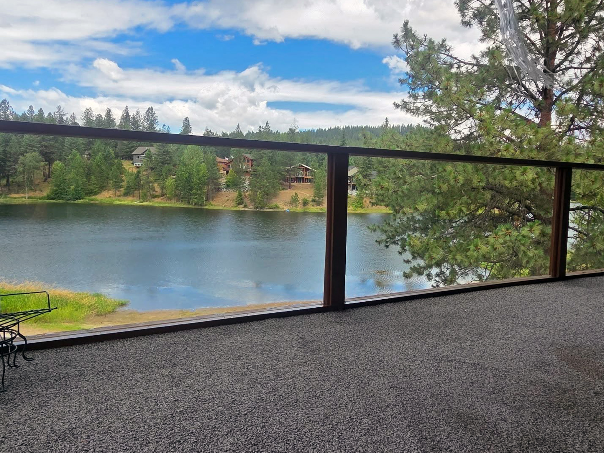 exterior window cleaning near Athol Idaho showing clear reflections in freshly cleaned glass