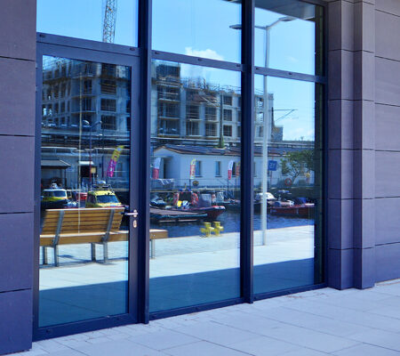 Commercial glass entryway representing window cleaning company comparisons in Coeur d'Alene ID