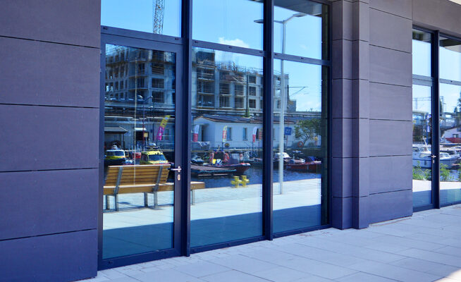 Commercial glass entryway representing window cleaning company comparisons in Coeur d'Alene ID