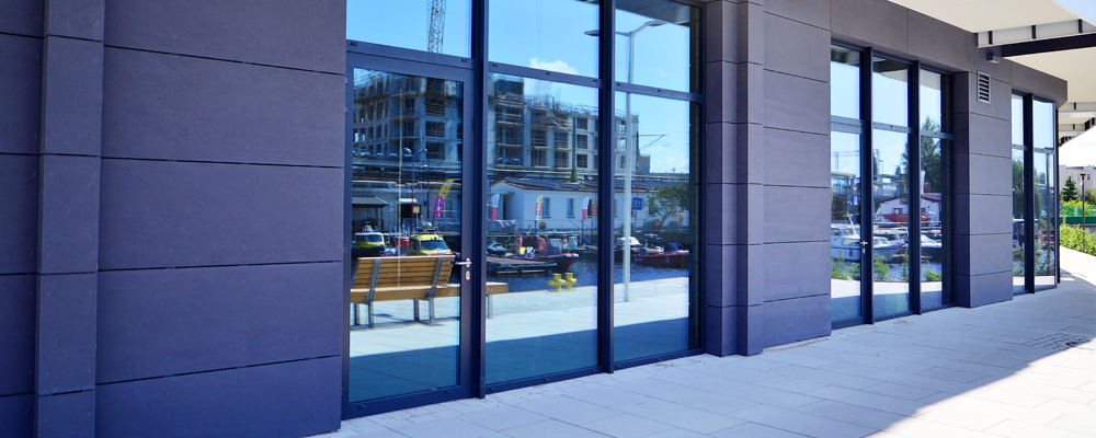 Commercial glass entryway representing window cleaning company comparisons in Coeur d'Alene ID